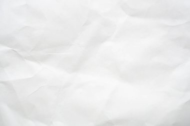 Abstract white crumpled and creased recycle paper texture background