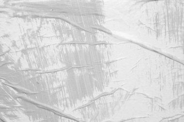 Beyaz buruşmuş ve buruşmuş kağıt poster arka planında gri renk