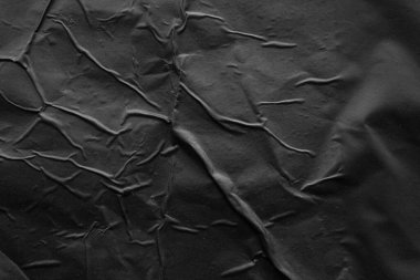 Siyah buruşmuş ve buruşmuş plastik poster dokusu arka planı