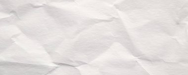 Abstract white crumpled and creased recycle paper texture background