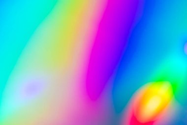 Abstract blur holographic rainbow foil iridescent background