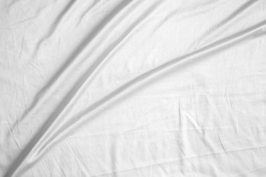 Soyut beyaz kırışık yatak örtüsü kumaş dokusu arka planı