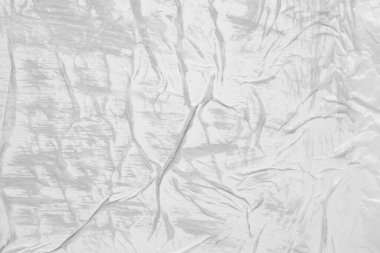 Beyaz buruşmuş ve buruşmuş kağıt poster arka planında gri renk