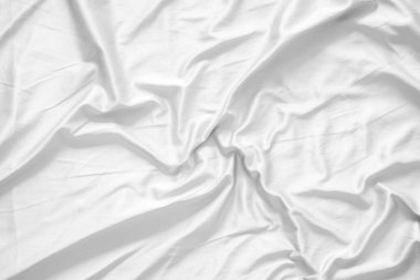 Soyut beyaz kırışık yatak örtüsü kumaş dokusu arka planı