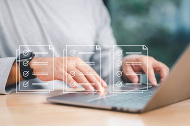 Businessman working with using laptop with virtual screen. Process data, manage files online to Internet efficiently. Online document database system and electronic document management system concept