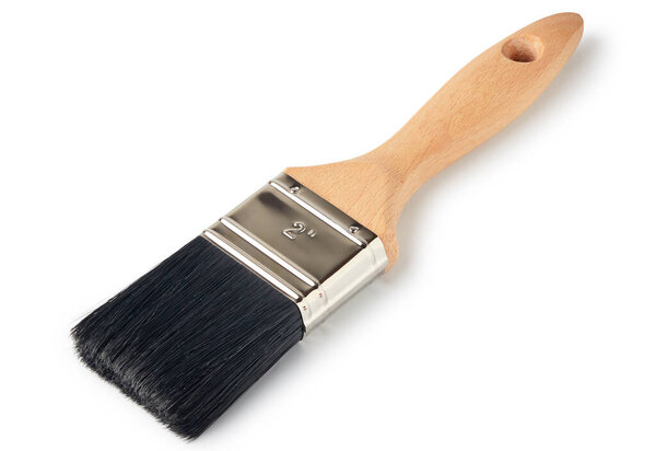 Paint brush with black bristle isolated over white background.