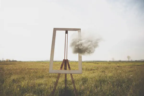 stock image surreal cloud escapes from a frame, concept of freedom and lifeeasel