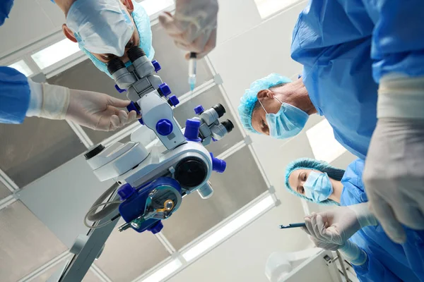 Close Photo Doctors Nurse Protective Suits Masks Holding Medical Instrument — Stock Photo, Image