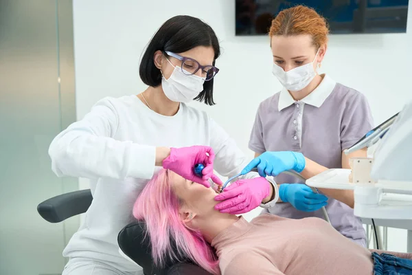 Assistant Helps Woman Dentist Installing Braces System Young Patient Staff — Stock Photo, Image