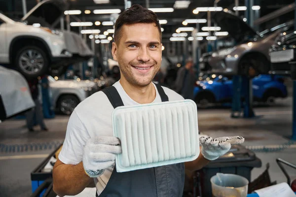 Portrait Smiling Man Special Suit Standing Garage Holding Air Filter — Stock Photo, Image