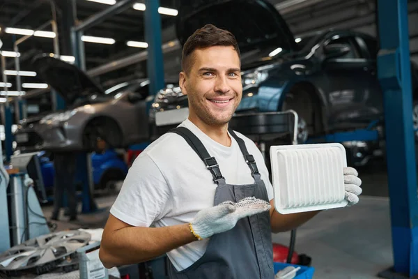 Portrait Smiling Male Special Suit Standing Garage Holding Air Filter — Stock Photo, Image