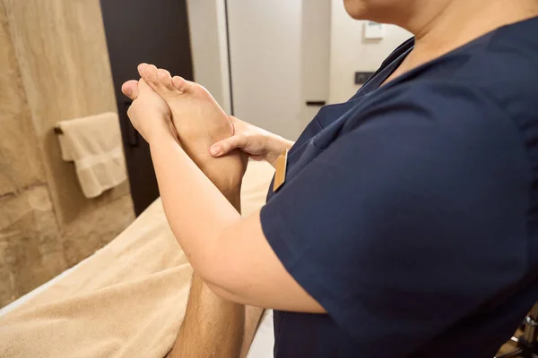 Medical Worker Massaging Client Feet Man Getting Limb Massage Medical — Foto Stock