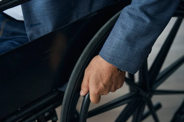 Close Photo Male Hand Wheel Wheelchair Man Gray Jacket Jeans — Stock Photo, Image