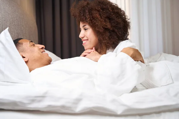 Happy Multiracial Man Woman Tenderly Look Each Other Lie Bed — Stock Photo, Image