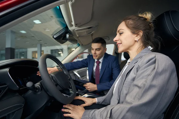 Smiling Lady Jacket Listening Businessman Car Sitting Front Seats — Stock Photo, Image