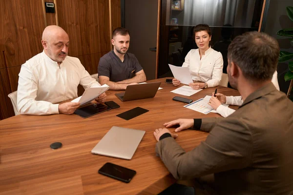 Group Doctors Sitting Table Prescription Looking Patient Office — Stock Photo, Image