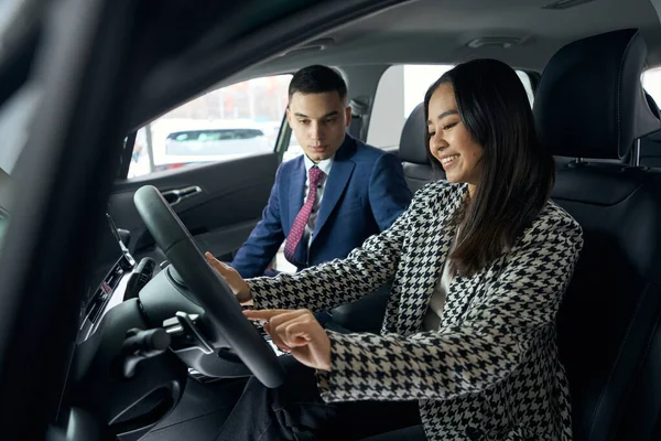 Woman Chooses Car Car Dealership Consultant Man Sits Passenger Seat — Stock Photo, Image