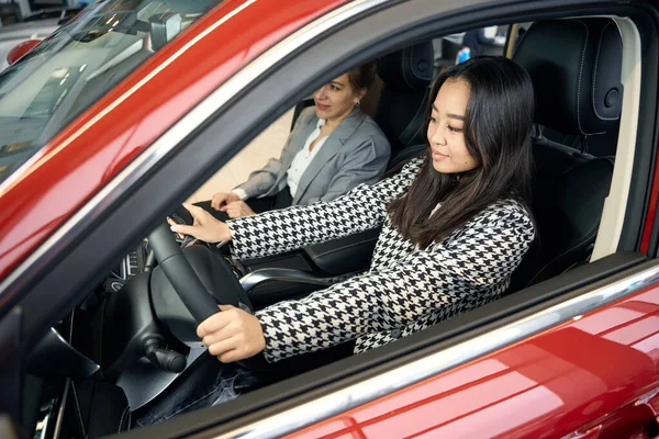 Two Joyful Successful Ladies Suits Sitting Red Automobile — Stock Photo, Image