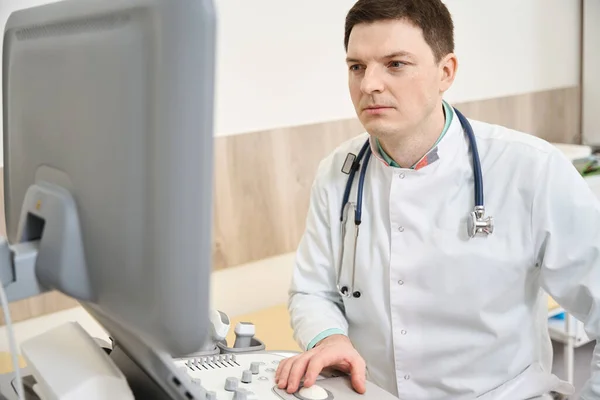 Cardiologist White Coat Sitting Ultrasound Scan Looking Monitor Clinic — Stock Photo, Image