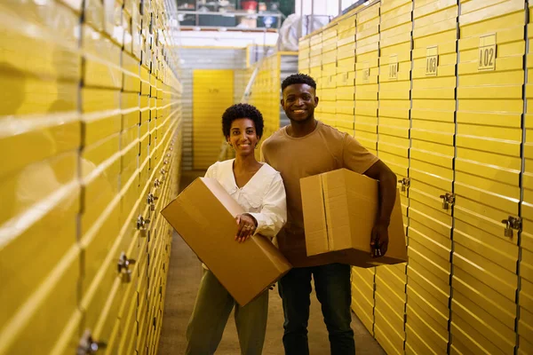 Curly Haired Guy His Girlfriend Standing Warehouse Cardboard Boxes Containers — Stock Photo, Image