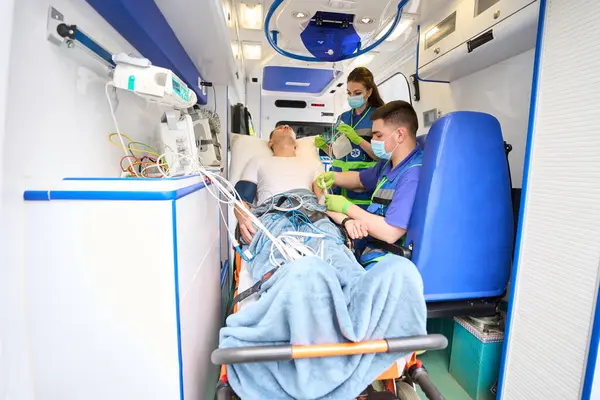 Mobile Team Paramedics Connects Patient Drip Ambulance — Stock Photo, Image