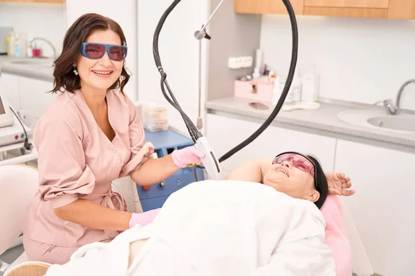 Beauty Master Performs Laser Hair Removal Procedure Women Wearing Safety — Stock Photo, Image