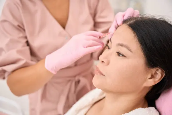 Woman Receives Beauty Injections Her Forehead Specialist Works Protective Gloves — Stock Photo, Image