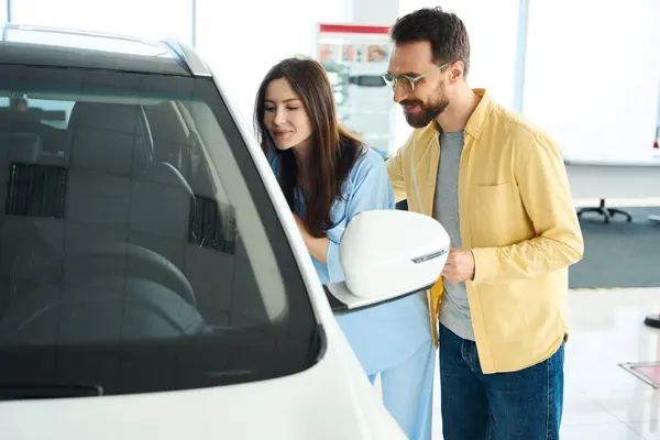 Smiling Woman Man Stylish Clothes Admiring White Car Spacious Dealership — Stock Photo, Image