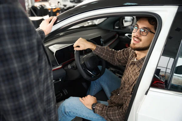 Handsome Young Man Taking Car Test Drive Talking Salesman Standing — Stock Photo, Image