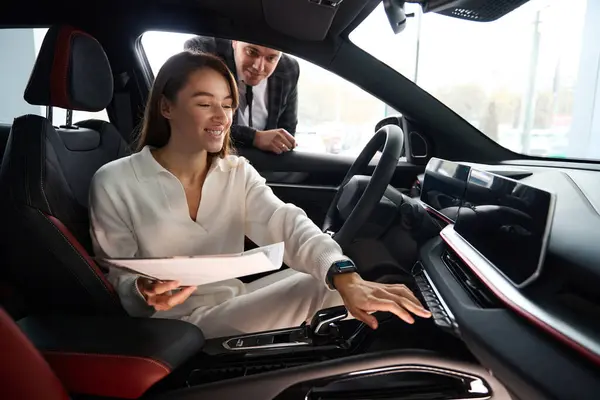Cheerful Woman Documents Sitting Her New Automobile Talking Dealership Salesman — Stock Photo, Image