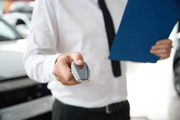 Hand Man Holding Clipboard Documents Automobile Keys Car Dealership — Stock Photo, Image