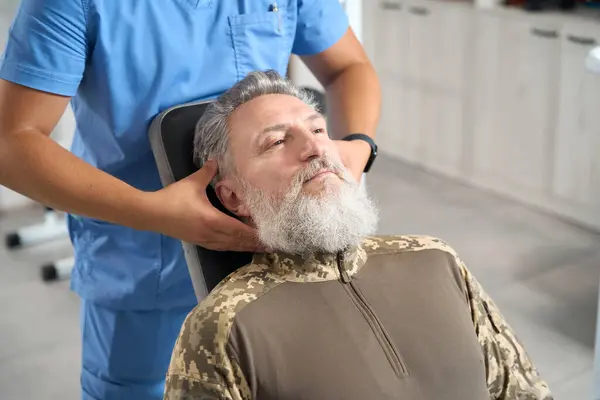 Male Chiropractor Works Patient Rehabilitation Center Gives Him Massage — Zdjęcie stockowe