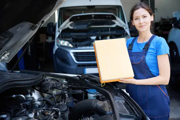 Woman Stands Filter Car Air Conditioner Car She Wearing Overalls — Stock Photo, Image