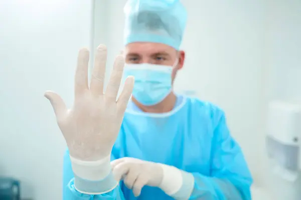 Cropped Image Blurred Male Caucasian Doctor Put Latex Glove Hand — Stock Photo, Image