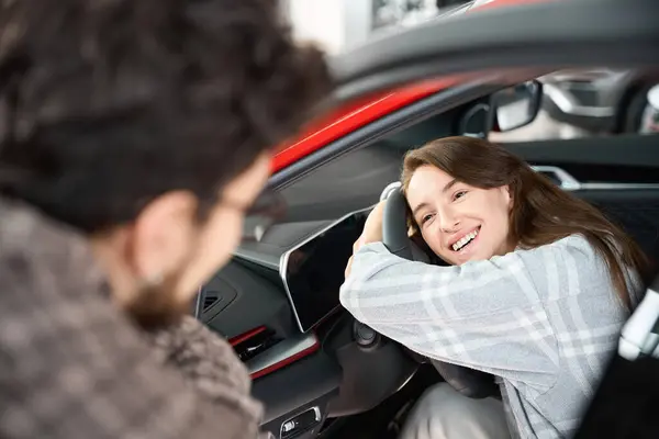Satisfied Smiling Woman Embracing Steering Wheel Her New Automobile Man — Stock Photo, Image