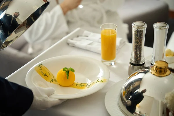 Waiter Serves Breakfast Hotel Guest Bed Man Wearing White Gloves — Stock Photo, Image