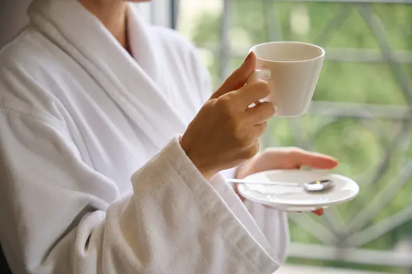 Cropped Photo Lady Dressed Bathrobe Holding Ceramic Saucer Cup Her — Stock Photo, Image