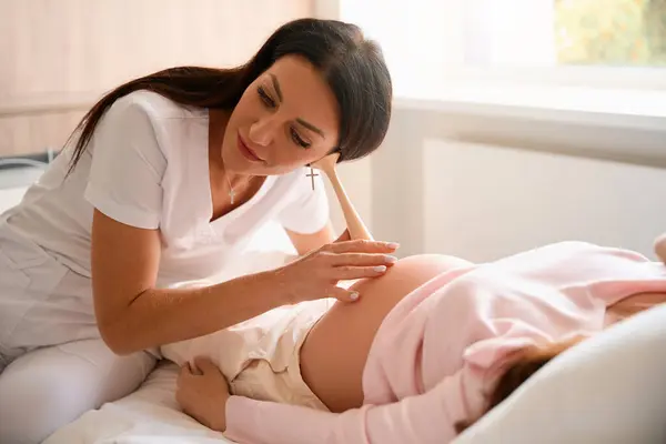 Female Gynecologist Examining Pregnant Woman Belly Doing Medical Check Hospital — Stock Photo, Image