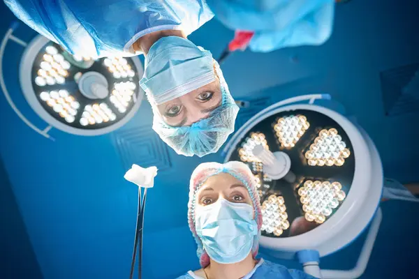 Doctors Surgeons Operating Room Looking Patient Bright Lamps Hospital — Stock Photo, Image