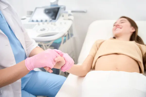 Partial Female Gynecologist Blurred Young Woman Holding Hands Ultrasound Room — Stock Photo, Image
