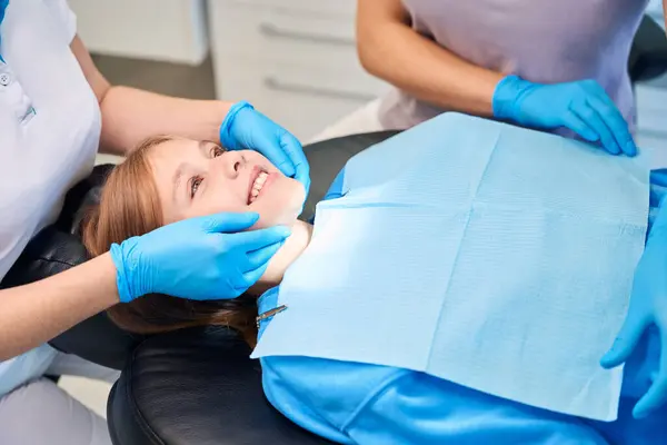 Girl Placed Chair Dental Procedures Medical Staff Wearing Protective Gloves — Stock Photo, Image