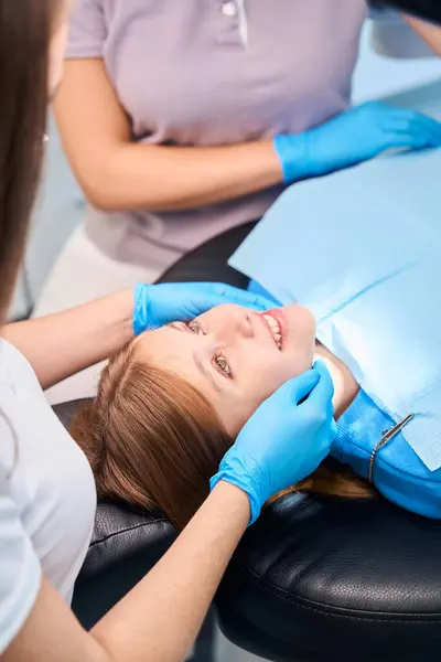 Smiling Young Female Patient Placed Chair Dental Procedures Medical Staff — Stock Photo, Image