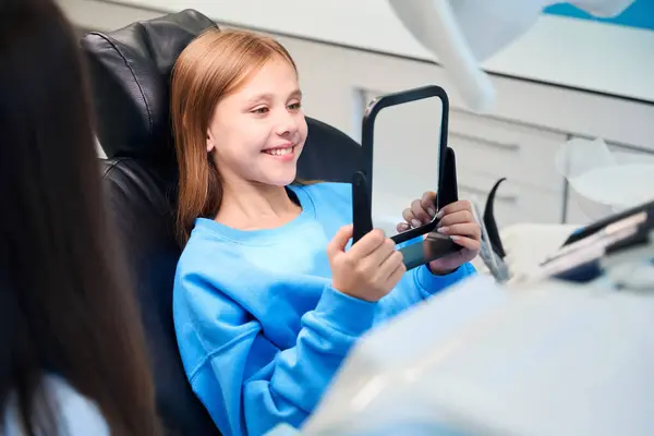Girl Dental Office Admires Her White Toothed Smile Mirror Next — Stock Photo, Image