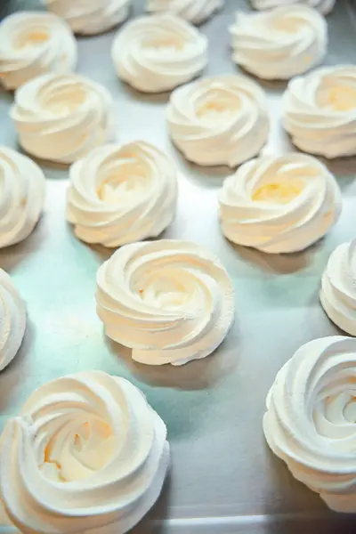 Close View Many White Meringue Nests Lying Tray Cooling Squeezing — Stock Photo, Image