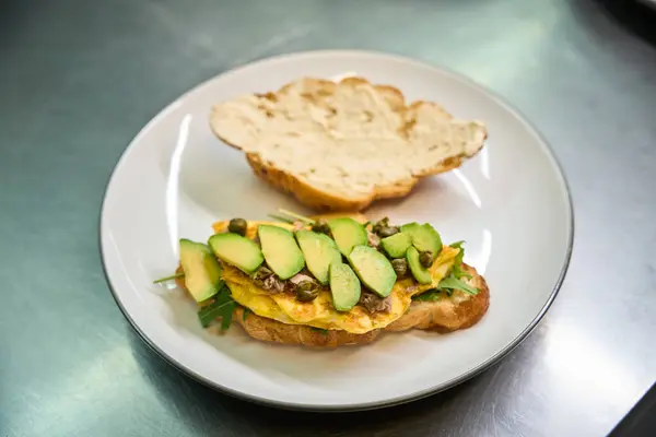 View Delicious Just Baked Crois Sandwich Scrambled Egg Arugula Avocado — Stock Photo, Image