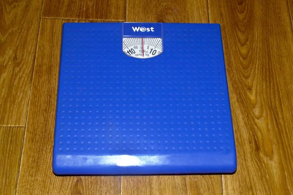 Blue floor home scales for weight control
