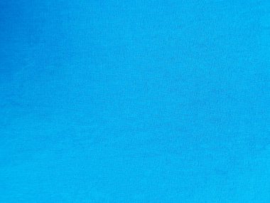 Metin için alanı olan parlak mavi kumaş arkaplanı, yakın plan