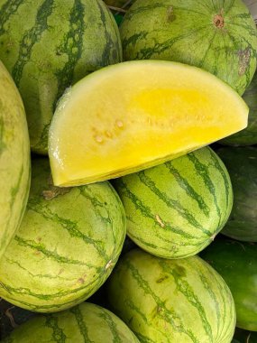fresh fruit on display and ready for sale in the shop. Yields from fruit farmers. apples, melons, grapes, watermelon, avocados, guavas, grape. fresh fruit background ready to be used as design mockup.