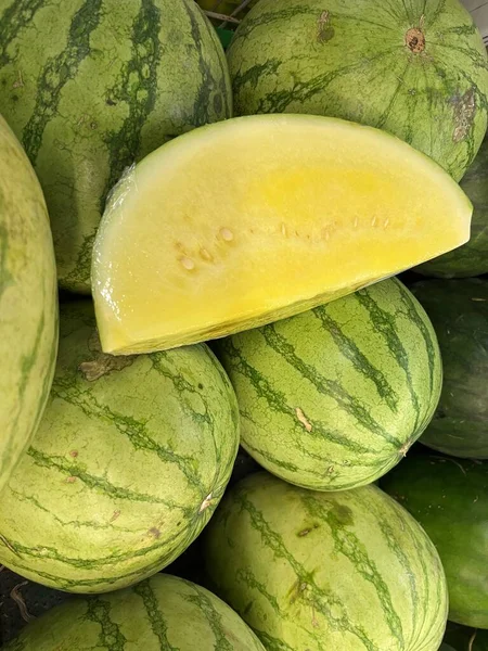 fresh fruit on display and ready for sale in the shop. Yields from fruit farmers. apples, melons, grapes, watermelon, avocados, guavas, grape. fresh fruit background ready to be used as design mockup.