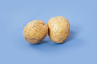 Washed potatoes, organic potato isolated on white background. Young potatoes. Peel potatoes.Harvesting collection. organic, freshly dug potatoes. Vegan. Vegetables.Potato slices.